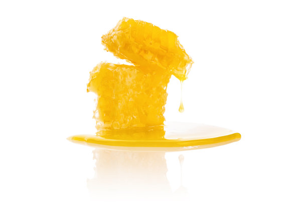 蜂蜜孤立的白色。图片下载