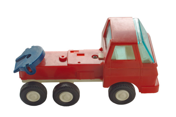 一辆没有拖车的旧玩具卡车被孤立在白色的背景上图片下载