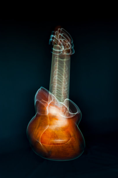 抽象的彩色运动模糊了吉他在黑暗图片下载