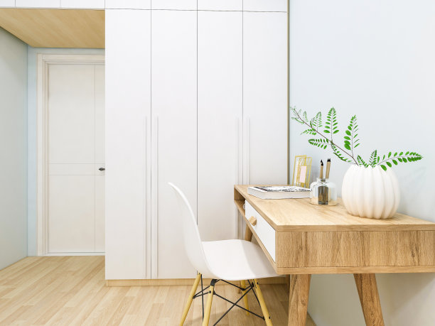 在现代卧室的衣柜旁边有课桌和椅子。图片下载