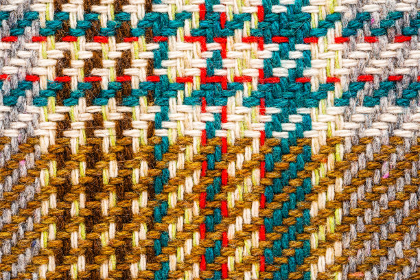 带彩色线的棕色格子织物。图片下载