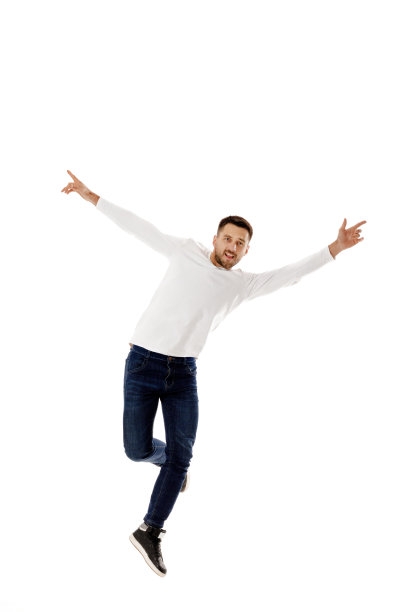 英俊的年轻胡子男子跳图片下载