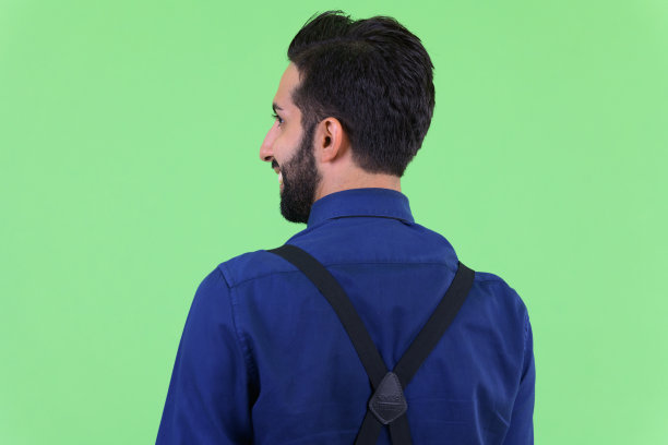 年轻快乐的波斯商人微笑背影特写图片下载