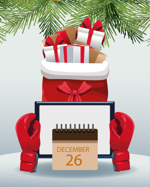 拳击手套拿着一个平板电脑和圣诞袋与礼物盒在灰色的背景图片下载