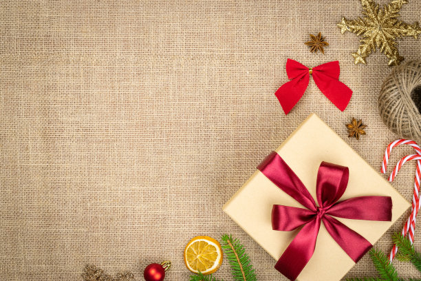 圣诞节的背景。元旦快乐。圣诞图案装饰上孤立亚麻纹理。节日喜庆概念图片下载