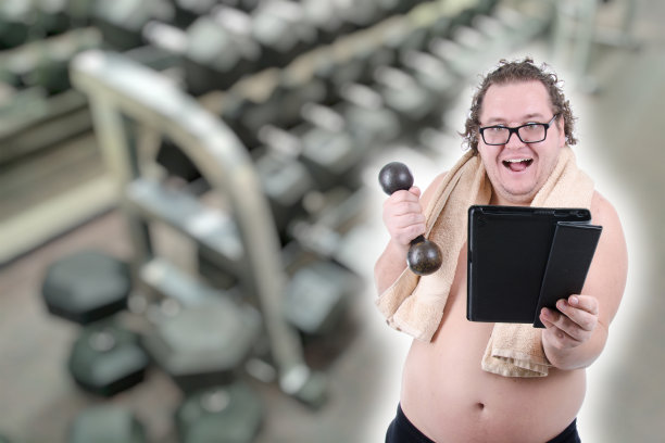 饮食和运动。有趣的胖子。图片下载
