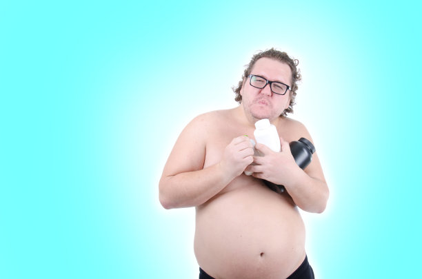 饮食和运动。有趣的胖子。图片下载
