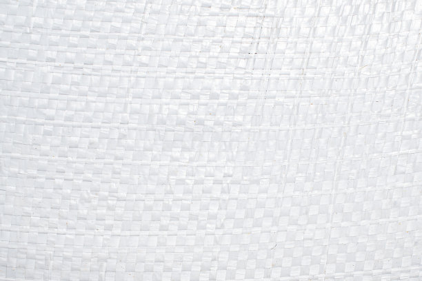 白色塑料袋表面。纹理或背景图片下载