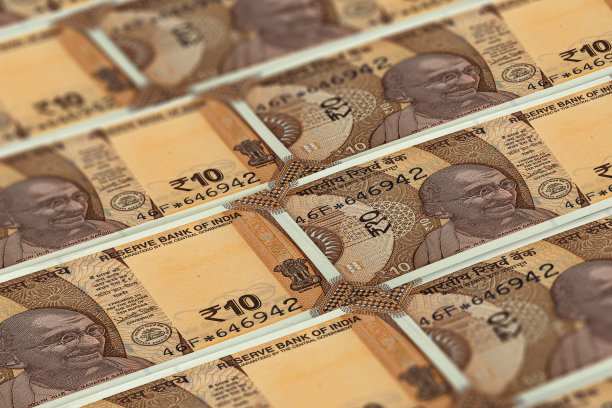 印度卢比。印度卢比纸币背景。十个印度卢比图片下载