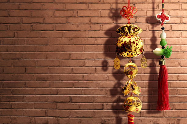 以砖墙为背景的中国新年装饰品图片下载
