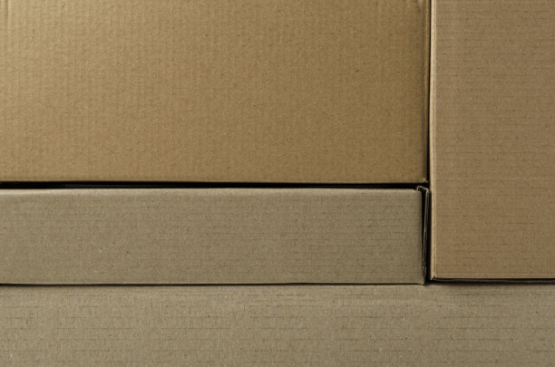 纸板箱的特写。堆叠的盒子作为背景图片下载