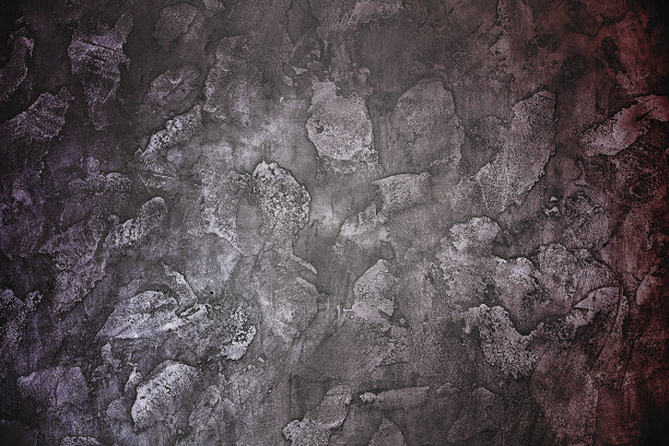 暗色的紫红色和棕红色背景灰泥墙。图片下载