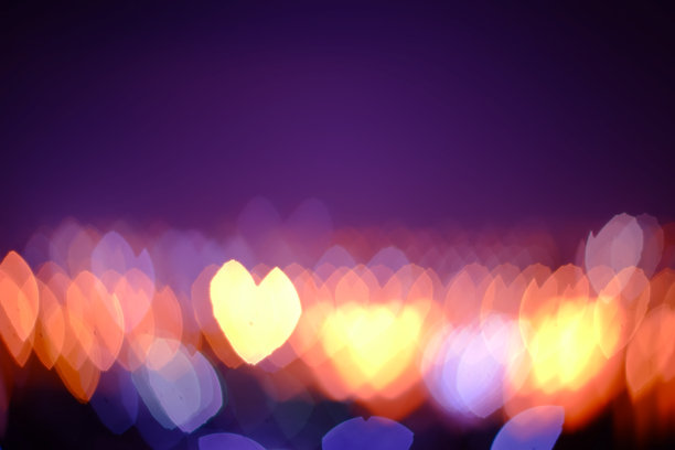 抽象模糊了心的散景灯光背景，色彩模糊了城市的夜光图片下载