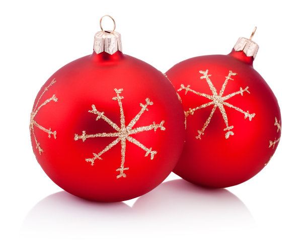 两个红色的圣诞装饰与丝带蝴蝶结孤立在白色的背景图片下载