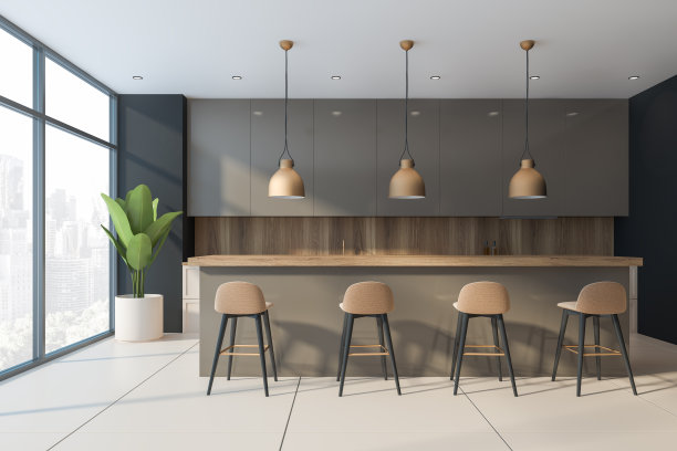 宽敞厨房里的米色长酒吧图片下载