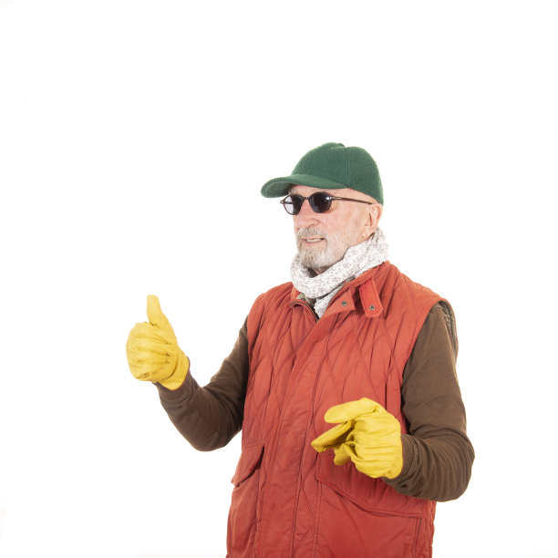 戴防护手套驾驶或手动工作的高级人员图片下载