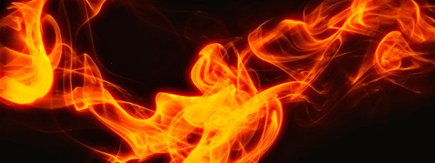 黑暗中漂浮的抽象火焰图片下载