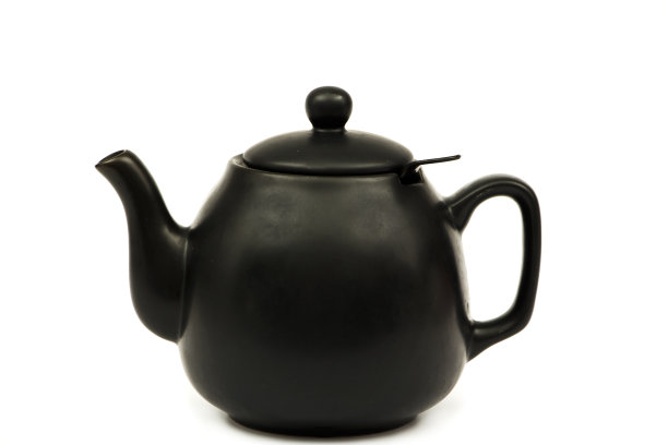 黑陶茶壶孤立在白色背景上。白色背景上的黑色茶壶。图片下载