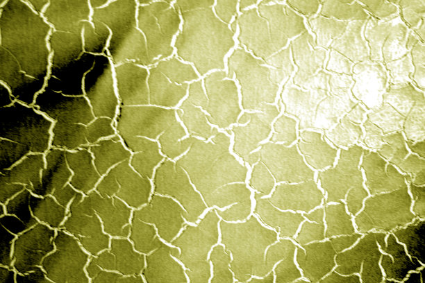 肮脏的皮革表面，黄色调的模糊效果。图片下载