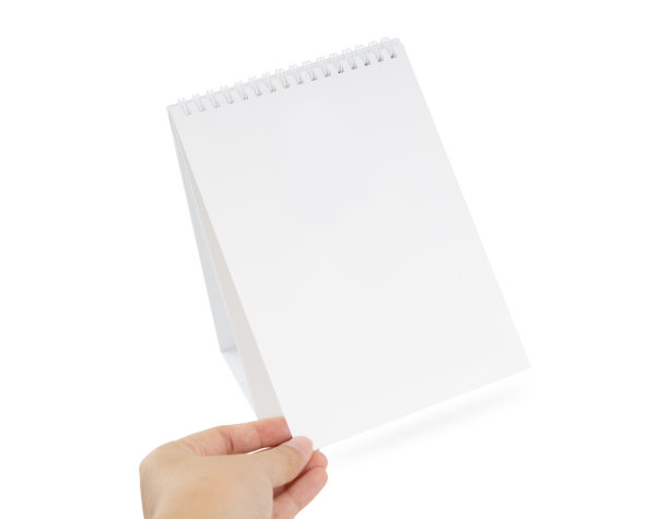 手握和打开空白日历上孤立的背景，使日期安排预约和组织。图片下载
