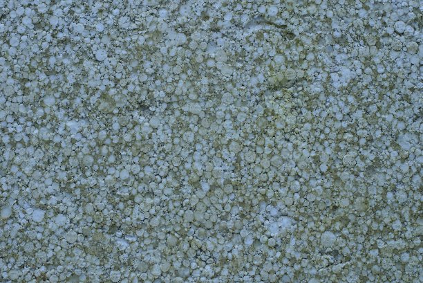 一块又旧又脏的聚苯乙烯泡沫塑料上的灰色塑料纹理图片下载