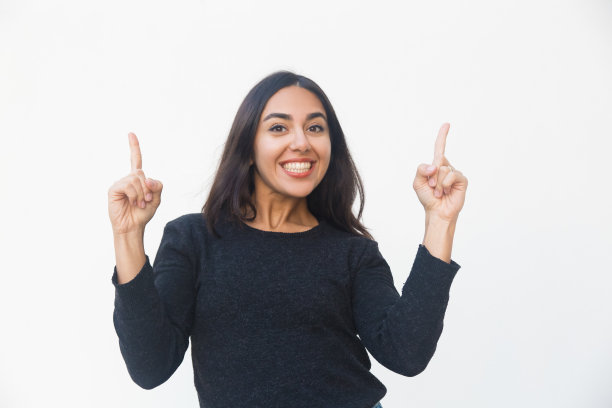 快乐快乐的女人竖起食指图片下载