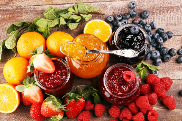 各种果酱，时令浆果果冻，薄荷，水果和橘子图片下载