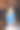 一个漂亮的年轻女人在她的厨房里摆着一盘成熟的红草莓。图片下载