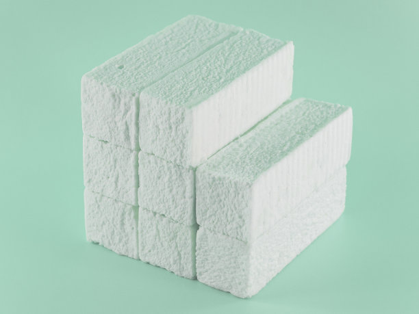 甘甜的绿色棉花糖薄荷口味的形式在一个几何形状图片下载