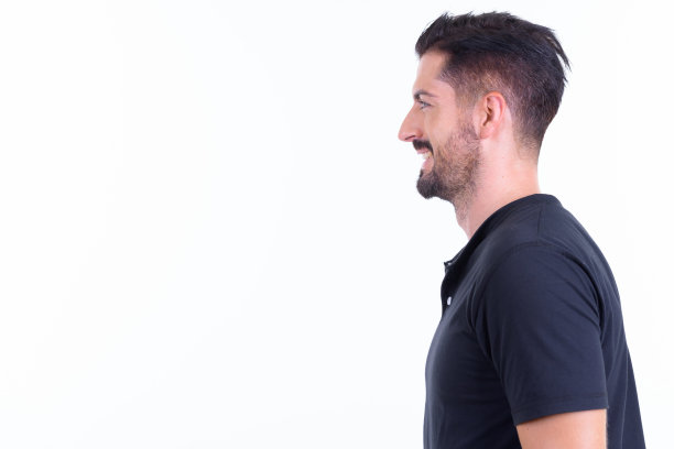 特写镜头快乐的年轻英俊的胡子男人微笑图片下载