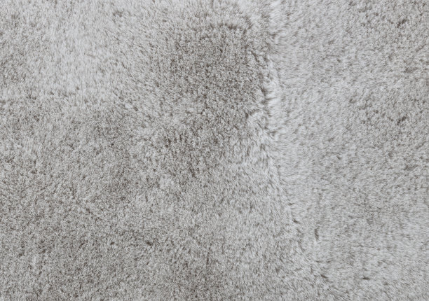 近距离柔软的白色毛皮地毯在填充框架布局图片下载