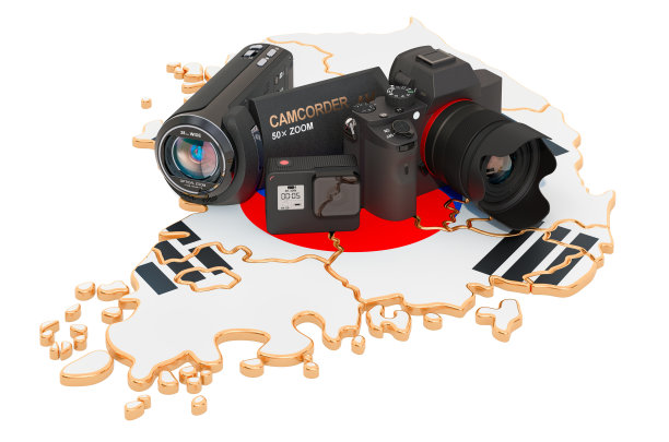 在韩国旅游、拍照、摄像。韩国地图上的数码相机、摄像机和动作摄影机。3D渲染孤立的白色背景图片下载