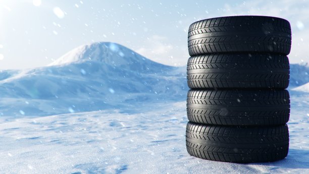 冬季轮胎上的背景是暴风雪，雪和滑的冬季道路。冬用轮胎的概念。概念轮胎，冬季胎面。轮更换。道路安全。3d插图与飘落的雪图片下载