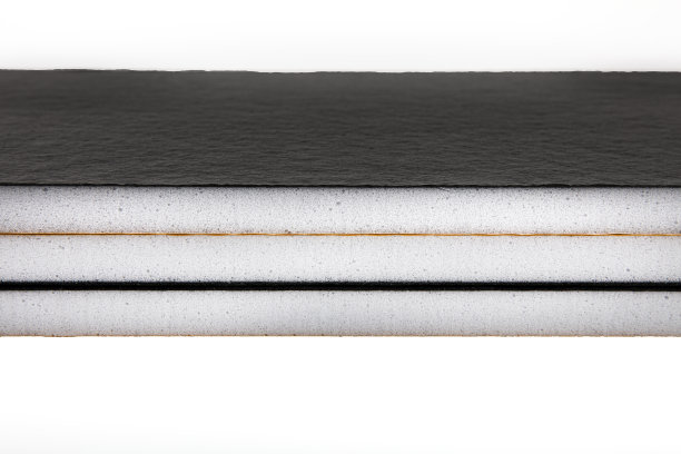 聚四氟乙烯涂层隔音板。橡胶板。工业用方形塑料片。图片下载