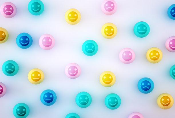 面部表情快乐与悲伤抽象图，独特思考，与众不同，蓝色背景上带有图标的彩色球体概念图片下载