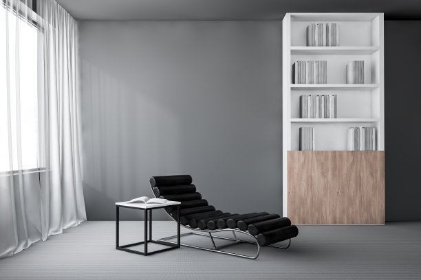 灰色的客厅，有扶手椅和书柜图片下载