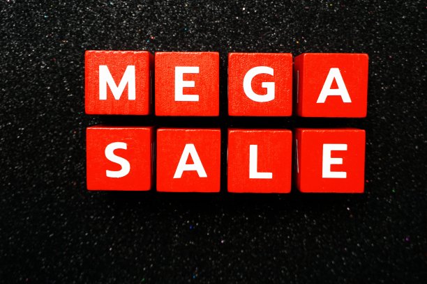 Mega Sale字母表上的黑色闪光背景图片下载
