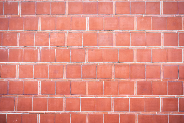真正的红色仿古复古砖色调的设计元素，中式街道屋的图案墙背景。素材图片
