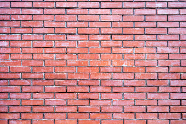 真正的红色仿古复古砖色调的设计元素，中式街道屋的图案墙背景。图片下载