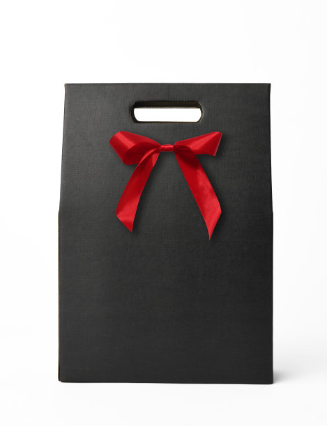 孤立拍摄的黑色礼品纸盒与红色丝带在白色背景图片下载
