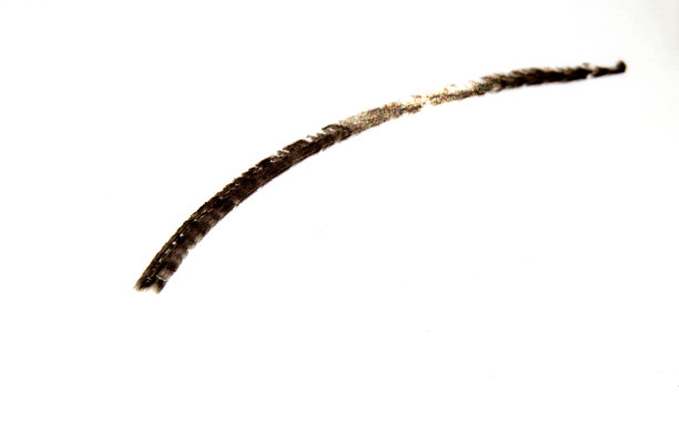 描线涂抹黑色眼线笔在白色孤立的背景上，美妆理念图片下载