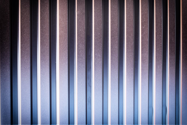 抽象背景，波纹金属板。美丽的梯度。照片的网站和布局。图片下载