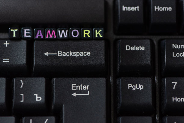 团队字从键盘上的块近距离。图片下载