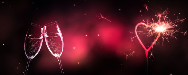 情人节之夜的烟火和两个香槟杯图片下载