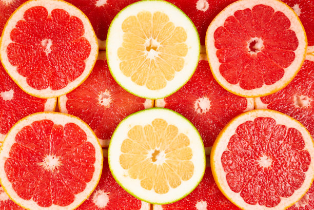 柚子和葡萄柚片背景。图片下载