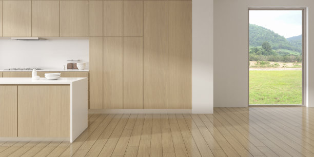 透视现代豪华内饰以餐桌和现代厨柜，厨房岛以自然为背景。3 d渲染。图片下载