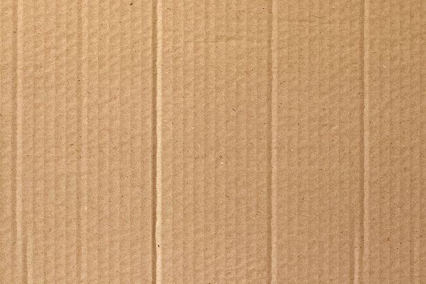 棕色硬纸板抽象背景，纹理回收纸盒在旧的复古模式设计艺术作品。图片下载