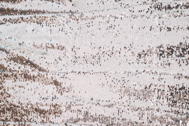 假日银色亮片背景与美丽的闪光。图片下载