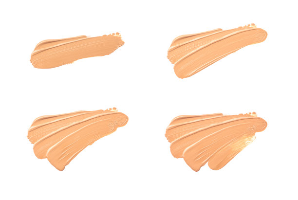 明亮的米色粉底污迹孤立在白色背景上。图片下载