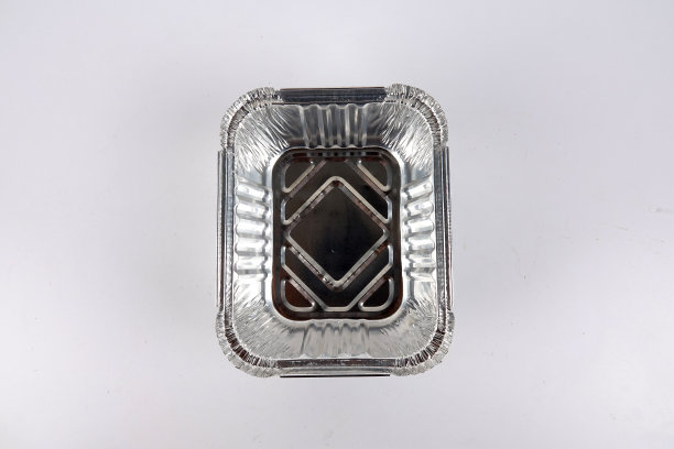 烤盘用锡纸包在白面包上图片下载